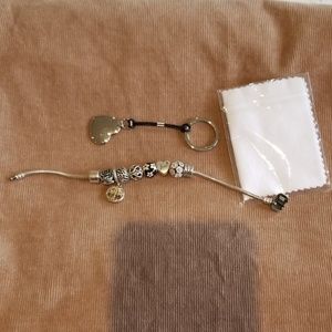 Genuine Pandora Silver Bracelet with charms.